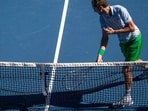 Russia's Daniil Medvedev smashes his racquet during his first round match on Rod Laver Arena at the Australian Open tennis tournament in Melbourne.