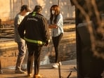 Meghan Markle, Duchess of Sussex, right, speaks with Pasadena Mayor Victor Gordo, center, and Doug Goodwin, who's home was destroyed by the Eaton Fire, in Altadena.