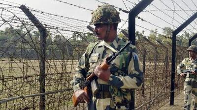 A BSF jawam patrols the India-Bangladesh border in Tripura. (PTI Photo)