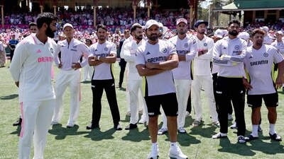 India's Jasprit Bumrah (L) reacts with teammates during the trophy ceremony after the fifth cricket Test match between Australia and India at The SCG in Sydney on January 5 (AFP) India's Jasprit Bumrah (L) reacts with teammates during the trophy ceremony after the fifth cricket Test match between Australia and India at The SCG in Sydney on January 5 (AFP)