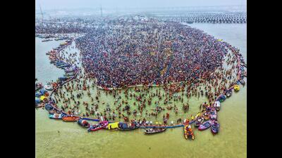 Devout at the Sangam Nose during the Mahakumbh on Tuesday (HT Photo)