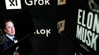 Screens displaying the logo of Grok, a generative artificial intelligence chatbot developed by xAI, the American company specializing in artificial intelligence and it's founder Elon Musk. (AFP) Screens displaying the logo of Grok, a generative artificial intelligence chatbot developed by xAI, the American company specializing in artificial intelligence and it's founder Elon Musk. (AFP)