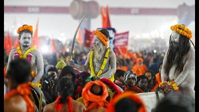 Naga Sadhus in procession before the first Amrit Snan of Mahakumbh-2025 on occasion of Makar Sankranti on Jan 14. (Deepak Gupta/HT)