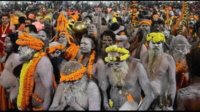 The dust that falls from the feet of Naga sadhus on the ground is sacred for us, said a devotee. (HT photo) The dust that falls from the feet of Naga sadhus on the ground is sacred for us, said a devotee. (HT photo)