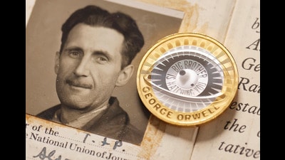 This photo, provided by The Royal Mint on Monday, Jan. 13, 2025, shows a portrait of George Orwell and a new £2 coin. (The Royal Mint/PinPep via AP) (AP) This photo, provided by The Royal Mint on Monday, Jan. 13, 2025, shows a portrait of George Orwell and a new £2 coin. (The Royal Mint/PinPep via AP) (AP)