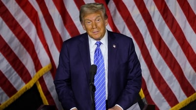 Trump expressed frustration over Biden's decision, complaining that the flags would be at half-staff during his inauguration on January 20. (REUTERS/Carlos Barria)