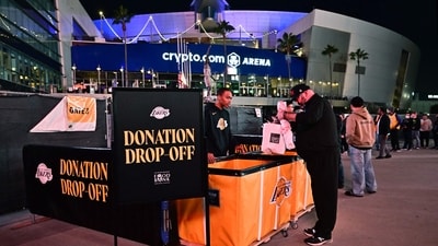 Los Angeles wildfires: People drop off donations for victims of the Los Angeles area fires before the Los Angeles Lakers host the San Antonio Spurs at Crypto Arena in downtown Los Angeles on January 13, 2025. (Frederic J. Brown/AFP) Los Angeles wildfires: People drop off donations for victims of the Los Angeles area fires before the Los Angeles Lakers host the San Antonio Spurs at Crypto Arena in downtown Los Angeles on January 13, 2025. (Frederic J. Brown/AFP)