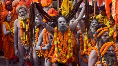 Naga Sadhus, identified by their ash-covered body and dread locks, are an essential part of Mahakumbh Mela. (PTI) Naga Sadhus, identified by their ash-covered body and dread locks, are an essential part of Mahakumbh Mela. (PTI)