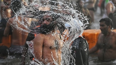 Naga Sadhu's take a holy dip at Sangam on the occasion of Makar Sakranti, the confluence of the Ganges, Yamuna and Saraswati rivers, during the "Maha Kumbh Mela" in Prayagraj, Uttar Pradesh, India (Deepak Gupta/ Hindustan Times) Naga Sadhu's take a holy dip at Sangam on the occasion of Makar Sakranti, the confluence of the Ganges, Yamuna and Saraswati rivers, during the "Maha Kumbh Mela" in Prayagraj, Uttar Pradesh, India (Deepak Gupta/ Hindustan Times)