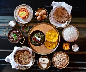 A sumptuous plate of Lohri delicacies (Anshuman Poyrekar/HT Photo)