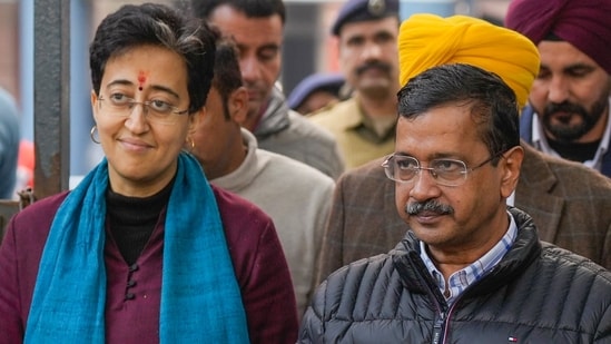 New Delhi: AAP national convener Arvind Kejriwal with Delhi Chief Minister and party leader Atishi leaves from the Election Commission office, in New Delhi, (PTI)