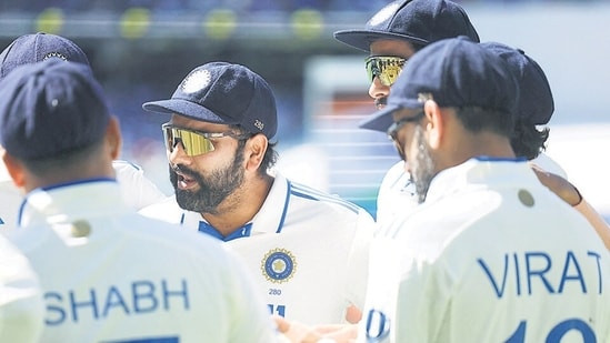 Rohit Sharma during a huddle before play on day five of the fourth Test at the Melbourne Cricket Ground (MCG). (AFP) (HT_PRINT)