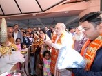 Union Home Minister Amit Shah with his wife Sonal Shah and son Jay Shah offers prayers to cow on the occasion of Makar Sankranti, at Shree Jagannath Temple in Ahmedabad on Tuesday. Union Home Minister Amit Shah with his wife Sonal Shah and son Jay Shah offers prayers to cow on the occasion of Makar Sankranti, at Shree Jagannath Temple in Ahmedabad on Tuesday.