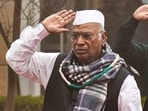 Congress President Mallikarjun Kharge takes the salute after hoisting the party flag during the inauguration of the new All India Congress Committee (AICC) headquarters 'Indira Bhawan', in New Delhi, Wednesday. Congress President Mallikarjun Kharge takes the salute after hoisting the party flag during the inauguration of the new All India Congress Committee (AICC) headquarters 'Indira Bhawan', in New Delhi, Wednesday.