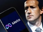 This photo illustration shows an image of Mark Zuckerberg, CEO of Meta, and a phone displaying the download page for the Facebook app. This photo illustration shows an image of Mark Zuckerberg, CEO of Meta, and a phone displaying the download page for the Facebook app.