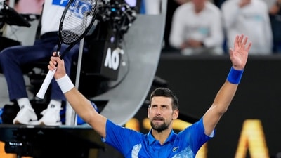 Novak Djokovic of Serbia celebrates after defeating Jaime Faria of Portugal in their second round match at the Australian Open. (AP)