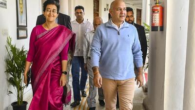 Delhi chief minister Atishi and senior AAP leader Manish Sisodia during the Delhi Assembly session, in New Delhi, Wednesday, Dec 4. (PTI)