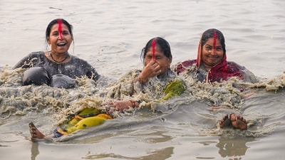 Women devotees take a holy dip in the Ganga river during the ongoing Gangasagar Mela 2025 on the occasion of the 'Makar Sankranti' festival. Seven ill devotees were airlifted to Kolkata for treatment. (PTI) Women devotees take a holy dip in the Ganga river during the ongoing Gangasagar Mela 2025 on the occasion of the 'Makar Sankranti' festival. Seven ill devotees were airlifted to Kolkata for treatment. (PTI)