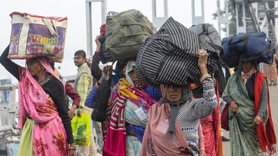 Pilgrims on their way to attend the Gangasagar Mela on the occasion of 'Makar Sankranti', in Kolkata. (ANI) Pilgrims on their way to attend the Gangasagar Mela on the occasion of 'Makar Sankranti', in Kolkata. (ANI)