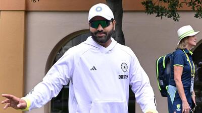 India’s Rohit Sharma walks towards the nets during a practice session ahead of the fifth cricket Test match between Australia and India at the Sydney Cricket Ground in Sydney on January 2, 2025. (Photo by Saeed KHAN / AFP) / -- IMAGE RESTRICTED TO EDITORIAL USE - STRICTLY NO COMMERCIAL USE -- (AFP) India’s Rohit Sharma walks towards the nets during a practice session ahead of the fifth cricket Test match between Australia and India at the Sydney Cricket Ground in Sydney on January 2, 2025. (Photo by Saeed KHAN / AFP) / -- IMAGE RESTRICTED TO EDITORIAL USE - STRICTLY NO COMMERCIAL USE -- (AFP)