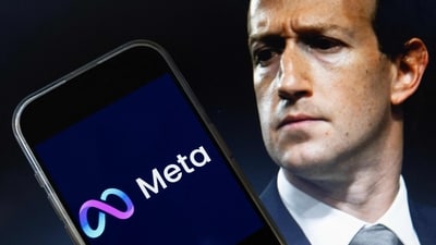 This photo illustration shows an image of Mark Zuckerberg, CEO of Meta, and a phone displaying the download page for the Facebook app. (AFP) This photo illustration shows an image of Mark Zuckerberg, CEO of Meta, and a phone displaying the download page for the Facebook app. (AFP)