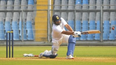 Rohit Sharma bats during a practice session of Mumbai's Ranji Trophy team at Wankhede Stadium in Mumbai. (PTI) Rohit Sharma bats during a practice session of Mumbai's Ranji Trophy team at Wankhede Stadium in Mumbai. (PTI)