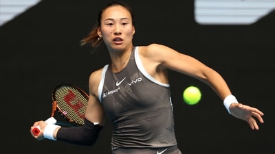 China's Zheng Qinwen hits a return against Germany's Laura Siegemund during their women's singles match on day four of the Australian Open (AFP) China's Zheng Qinwen hits a return against Germany's Laura Siegemund during their women's singles match on day four of the Australian Open (AFP)
