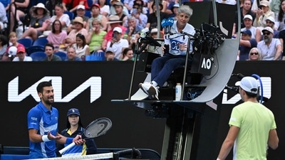Serbia's Novak Djokovic reacts after the lights were turned on during a game in his men's singles match against Portugal's Jaime Faria on day four of the Australian Open. (AFP)