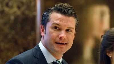 FILE - Pete Hegseth walks to an elevator for a meeting with President-elect Donald Trump at Trump Tower in New York, Dec. 15, 2016. (AP Photo/Evan Vucci, File) (AP) FILE - Pete Hegseth walks to an elevator for a meeting with President-elect Donald Trump at Trump Tower in New York, Dec. 15, 2016. (AP Photo/Evan Vucci, File) (AP)