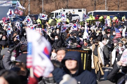 Supporters of impeached South Korean President Yoon Suk Yeol stage a rally to oppose his impeachment near the presidential residence in Seoul, South Korea, Wednesday, Jan. 15, 2025. (AP Photo/Lee Jin-man) (AP) Supporters of impeached South Korean President Yoon Suk Yeol stage a rally to oppose his impeachment near the presidential residence in Seoul, South Korea, Wednesday, Jan. 15, 2025. (AP Photo/Lee Jin-man) (AP)