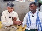  Andhra Pradesh Chief Minister N Chandrababu Naidu offers coffee to the beneficiary of NTR Bharosa Pension, during his visit to the latter's home, to distribute pension, at Yalamanda village, in Palnadu.

