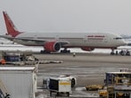 An Air India Boeing passenger has accused the airline of downgrading him to economy class