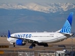 A United Airlines jetliner taxis down a runway for take off at Denver International Airport, Tuesday, Dec. 24, 2024, in Denver. (AP Photo/David Zalubowski)