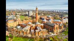 Birmingham University on a sunny day. The two protagonists of Nice Work live in Rummridge. Dr Penrose works as a temporary professor of English literature at Rummidge University, a stand-in for the University of Birmingham. David Lodge (1935-2025) taught English literature from 1960 to 1987 at the university, where he also earned a PhD in 1967. (Shutterstock)