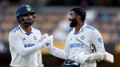 India's Akash Deep (L) and teammate Jasprit Bumrah react as they leave the ground at the end of day four of the third cricket Test match between Australia and India (AFP)