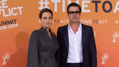 After his divorce from Angelina Jolie, Brad Pitt is reportedly happier and relieved. (Photo by CARL COURT / AFP) (AFP) After his divorce from Angelina Jolie, Brad Pitt is reportedly happier and relieved. (Photo by CARL COURT / AFP) (AFP)