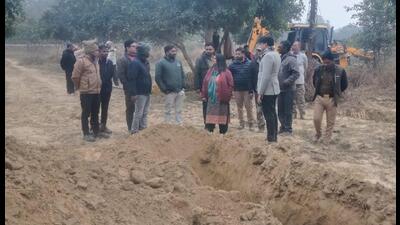 Forest officers at the site where trench was made to trap tiger (Sourced)