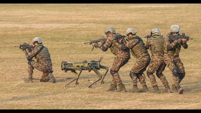 Kolkata: Army personnel along with a robotic mule perform during 'Military Tattoo' on the occasion of 'Vijay Diwas 2024', marking India's victory in the 1971 Bangladesh liberation war, at RCTC ground in Kolkata, Monday, Dec. 16, 2024. (PTI Photo/Swapan Mahapatra (PTI) Kolkata: Army personnel along with a robotic mule perform during 'Military Tattoo' on the occasion of 'Vijay Diwas 2024', marking India's victory in the 1971 Bangladesh liberation war, at RCTC ground in Kolkata, Monday, Dec. 16, 2024. (PTI Photo/Swapan Mahapatra (PTI)