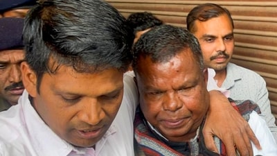 Congress MLA and former state excise minister Kawasi Lakhma, right, being taken to court by the Enforcement Directorate (ED) officials in an alleged liquor scam, in Raipur, Chhattisgarh. (PTI) Congress MLA and former state excise minister Kawasi Lakhma, right, being taken to court by the Enforcement Directorate (ED) officials in an alleged liquor scam, in Raipur, Chhattisgarh. (PTI)