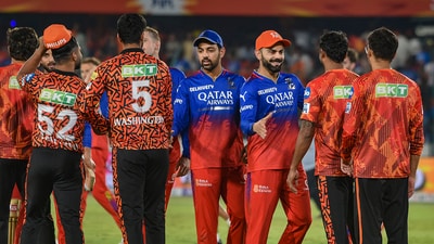 Royal Challengers Bengaluru and Sunrisers Hyderabad players greet each other (PTI) Royal Challengers Bengaluru and Sunrisers Hyderabad players greet each other (PTI)