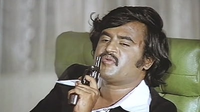 Rajinikanth in a still from R Krishnamoorthy's 1980 film Billa. Rajinikanth in a still from R Krishnamoorthy's 1980 film Billa.