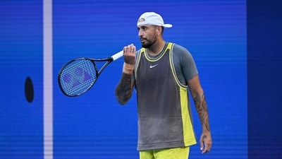 Australia's Nick Kyrgios blows on his racket handle between points against Britain's Jacob Fearnley during their men's singles match on day two of the Australian Open. (AFP) Australia's Nick Kyrgios blows on his racket handle between points against Britain's Jacob Fearnley during their men's singles match on day two of the Australian Open. (AFP)