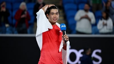 Tennis - Australian Open - Melbourne Park, Melbourne, Australia - January 16, 2025 Learner Tien of the U.S. after winning his second round match against Russia's Daniil Medvedev REUTERS/Jaimi Joy (REUTERS)