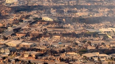 In this aerial view taken from a helicopter, burned homes are seen from above during the Palisades fire near the Pacific Palisades neighborhood of Los Angeles, California on January 9, 2025. Terrified residents caught in blazing neighbourhoods, influencers ignoring the ban on drones and the frightening unpredictability of the wildfires are just some of what journalists covering the fires ravaging Los Angeles for AFP have had to manage.
The United States' second-largest city has never faced a blaze of this scale, driven by an extreme autumn drought and fierce Santa Ana winds -- the strongest since 2011 -- that have turned dry hills into kindling, fuelling a relentless inferno that has raged for more than a week. (Photo by JOSH EDELSON / AFP) (AFP) In this aerial view taken from a helicopter, burned homes are seen from above during the Palisades fire near the Pacific Palisades neighborhood of Los Angeles, California on January 9, 2025. Terrified residents caught in blazing neighbourhoods, influencers ignoring the ban on drones and the frightening unpredictability of the wildfires are just some of what journalists covering the fires ravaging Los Angeles for AFP have had to manage.
The United States' second-largest city has never faced a blaze of this scale, driven by an extreme autumn drought and fierce Santa Ana winds -- the strongest since 2011 -- that have turned dry hills into kindling, fuelling a relentless inferno that has raged for more than a week. (Photo by JOSH EDELSON / AFP) (AFP)