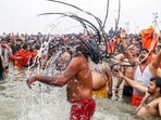 Prayagraj, Jan 14 (ANI): Naga sadhus take 'Amrit Snan' at Triveni Sangam on the occasion of 'Makar Sankranti' during the Maha Kumbh 2025, in Prayagraj on Tuesday. (ANI Photo) Prayagraj, Jan 14 (ANI): Naga sadhus take 'Amrit Snan' at Triveni Sangam on the occasion of 'Makar Sankranti' during the Maha Kumbh 2025, in Prayagraj on Tuesday. (ANI Photo)