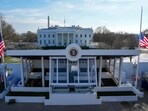 Workers continue with the finishing touches on the presidential reviewing stand on Pennsylvania outside the White House Thursday, Jan. 16, 2025, in Washington, ahead of President-elect Donald Trump's inauguration. 