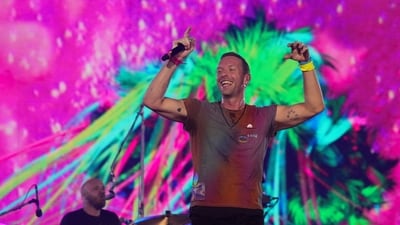 Chris Martin of Coldplay performs at Wembley Stadium, in London, Britain, August 12, 2022. (REUTERS)