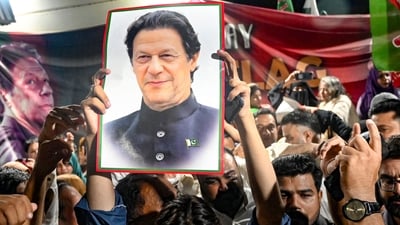 FILE Photo: Supporters of Pakistan's jailed former prime minister Imran Khan hold his poster as they celebrate after he was aquitted of leaking state secrets following a court verdict in Karachi. (AFP) FILE Photo: Supporters of Pakistan's jailed former prime minister Imran Khan hold his poster as they celebrate after he was aquitted of leaking state secrets following a court verdict in Karachi. (AFP)