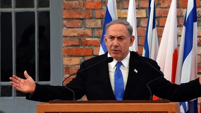 (FILES) Israeli Prime Minister Benjamin Netanyahu delivers a speech during the opening of the Permanent Exhibition SHOAH at the former Nazi death camp Auschwitz-Birkenau State Museum,. (AFP) (FILES) Israeli Prime Minister Benjamin Netanyahu delivers a speech during the opening of the Permanent Exhibition SHOAH at the former Nazi death camp Auschwitz-Birkenau State Museum,. (AFP)