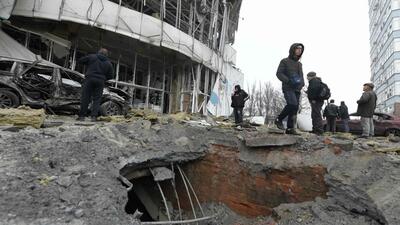 People gather near a damaged store following shelling, which local officials called a Ukrainian military strike, in Donetsk, Russian-controlled Ukraine, on January 10 (AFP FILE PHOTO) People gather near a damaged store following shelling, which local officials called a Ukrainian military strike, in Donetsk, Russian-controlled Ukraine, on January 10 (AFP FILE PHOTO)
